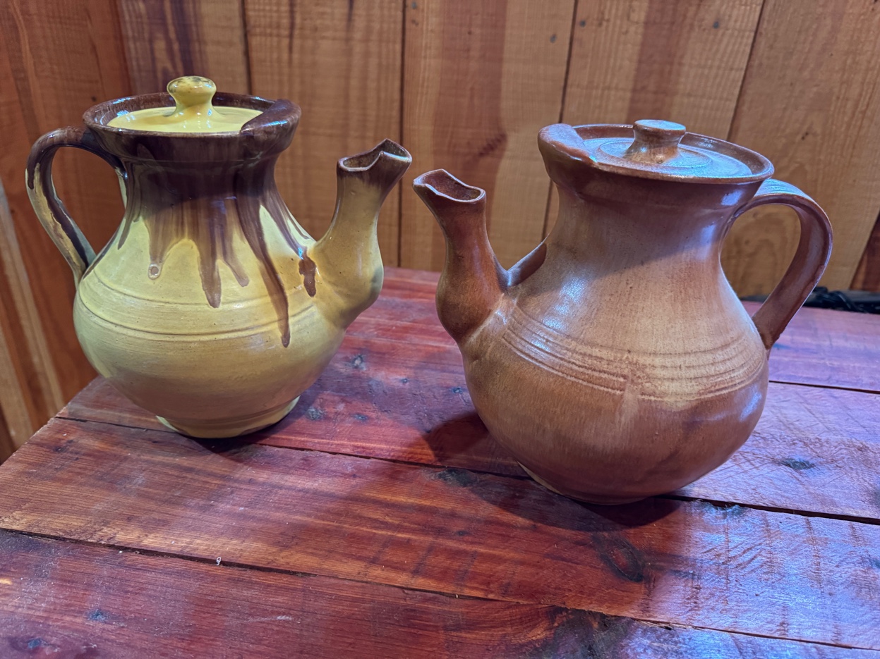 M.L. Owens earth tone teapots