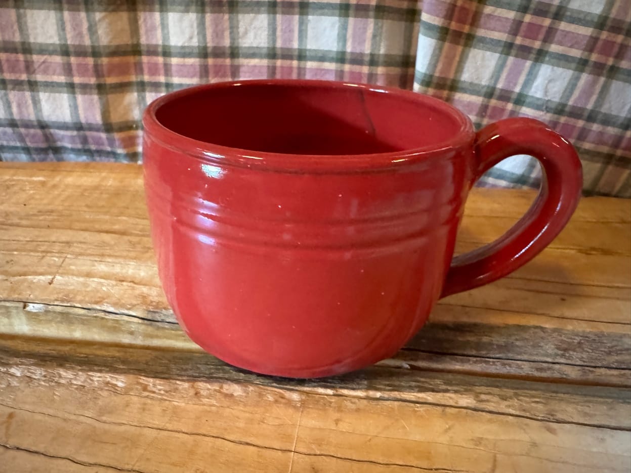 Red mugs by Nancy Owens Brewer