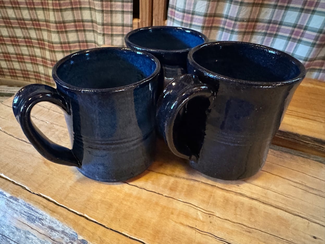 Dark blue mugs by Nancy Owens Brewer