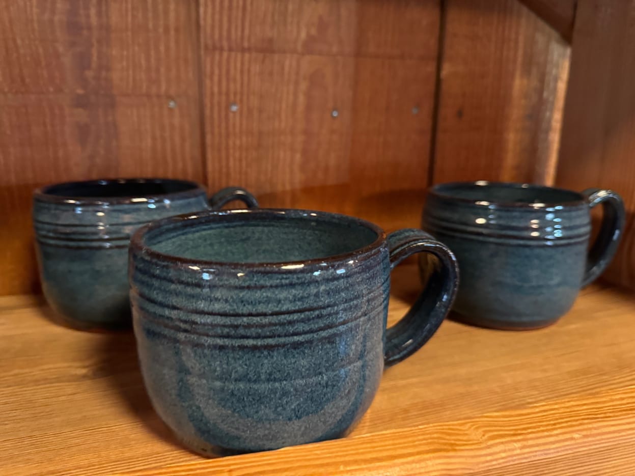 Blue-green mugs by Nancy Owens Brewer