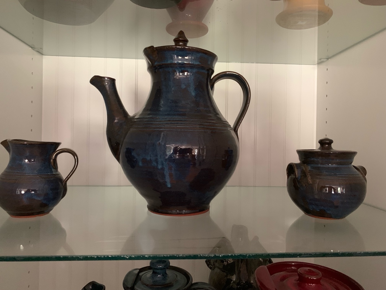 M.L. Owens two teapots side by side