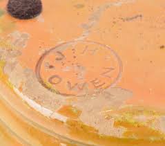 J.H. Owen pottery stamp impressed into clay base